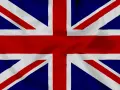Flaga Wielkiej Brytanii, Union Jack, z widocznymi fałdami materiału.
